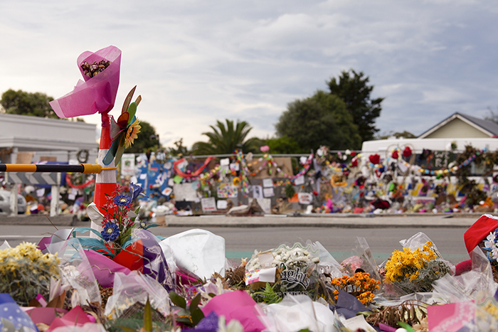 Fine art street photo of a floral tribute outside a Christchurch Mosque.