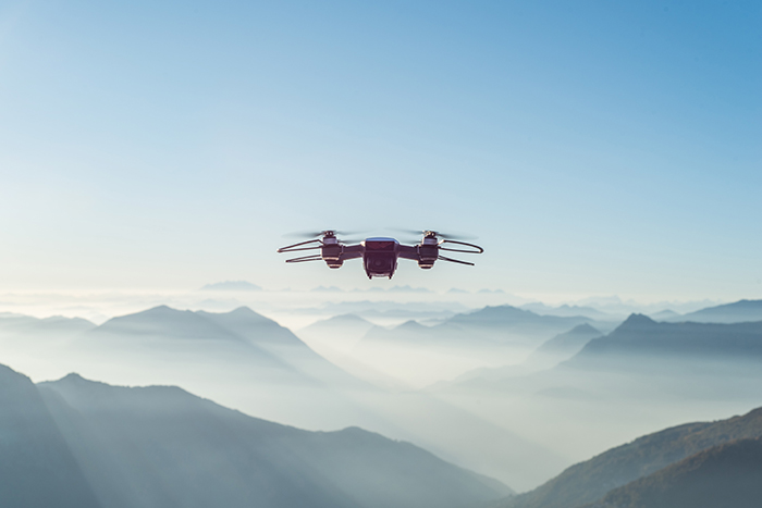 A drone flying over mountains