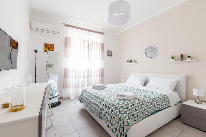 A beautiful real estate shot of the interior of a bedroom