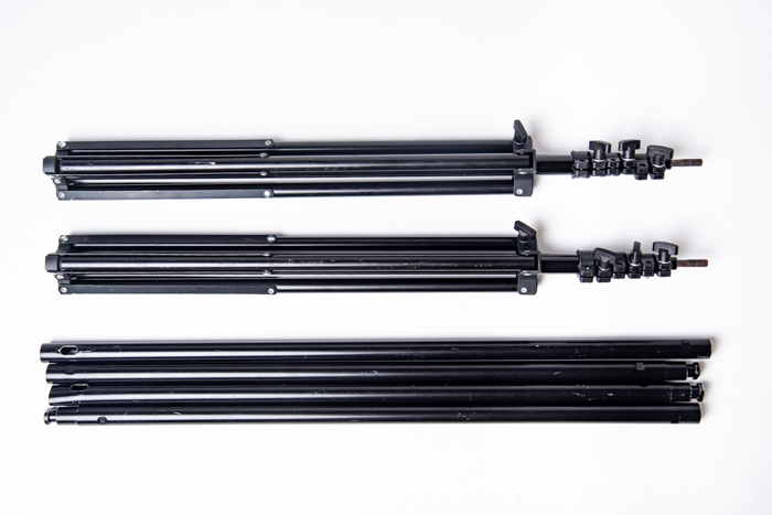 An overhead view of a background stand kit