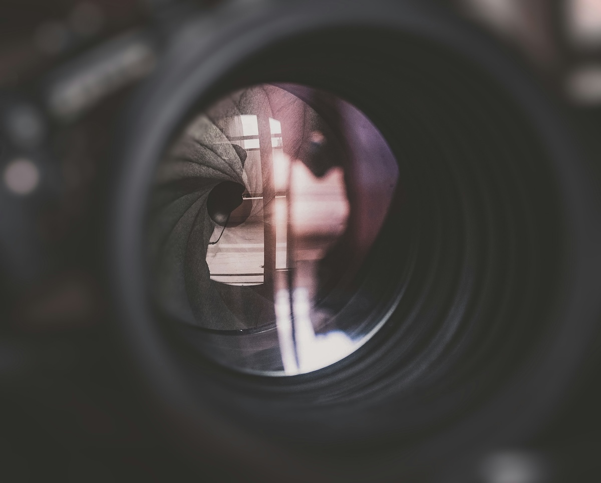 Close-up of a camera lens aperture