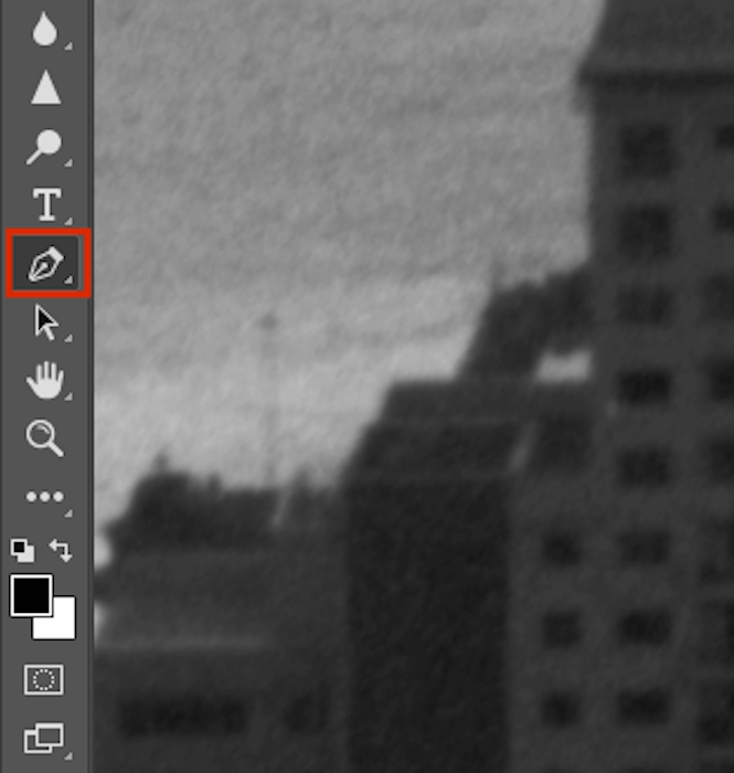 An image editor, which has a black and white photo of a cityscape with a skyscraper, and a toolbar on the left side.