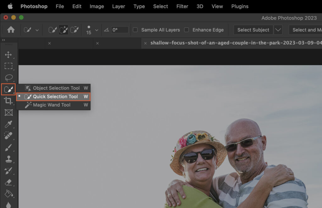 An open photo editing software, where two people are shown on the screen.