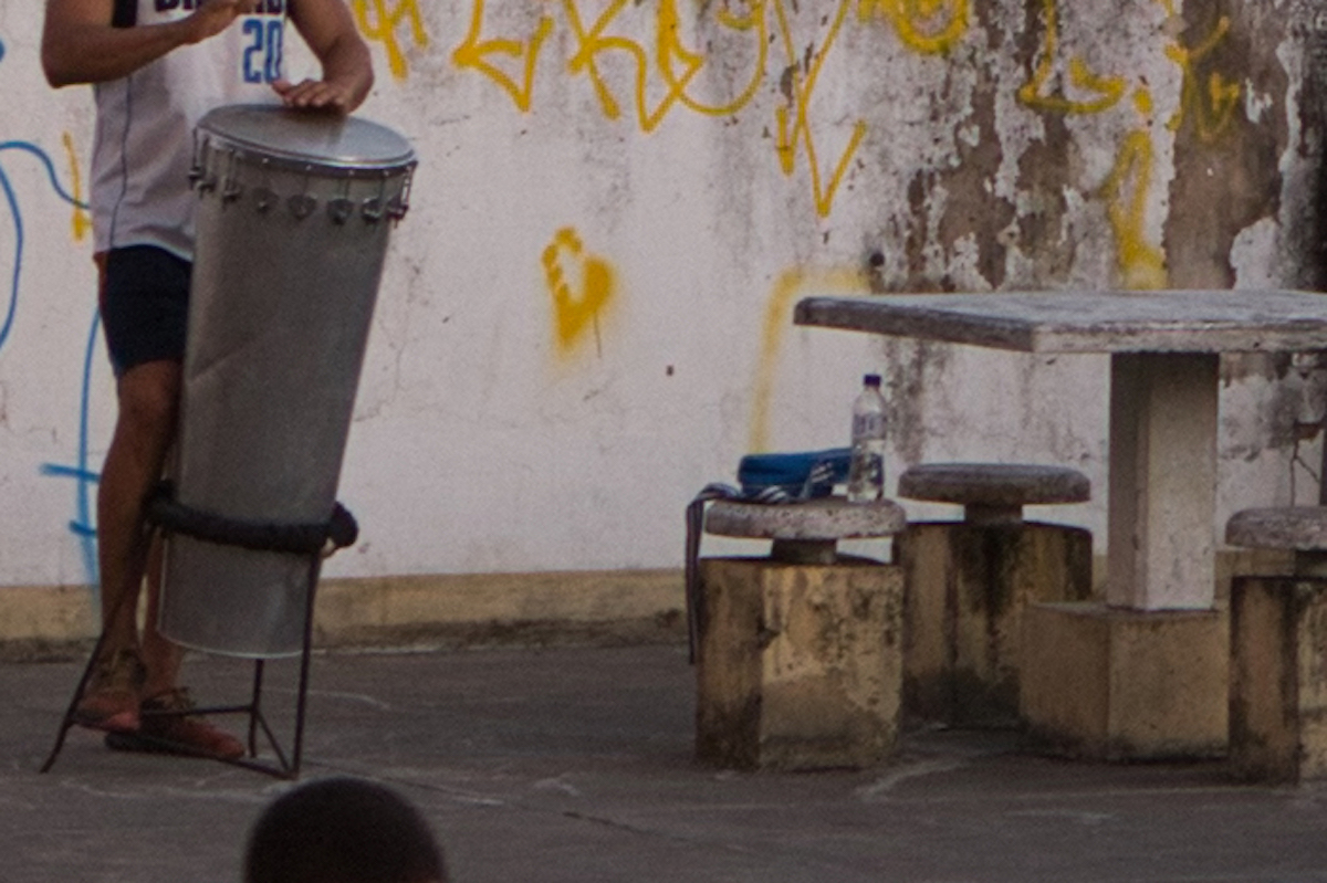 Cropped Luminar Neo image with person playing steel drums